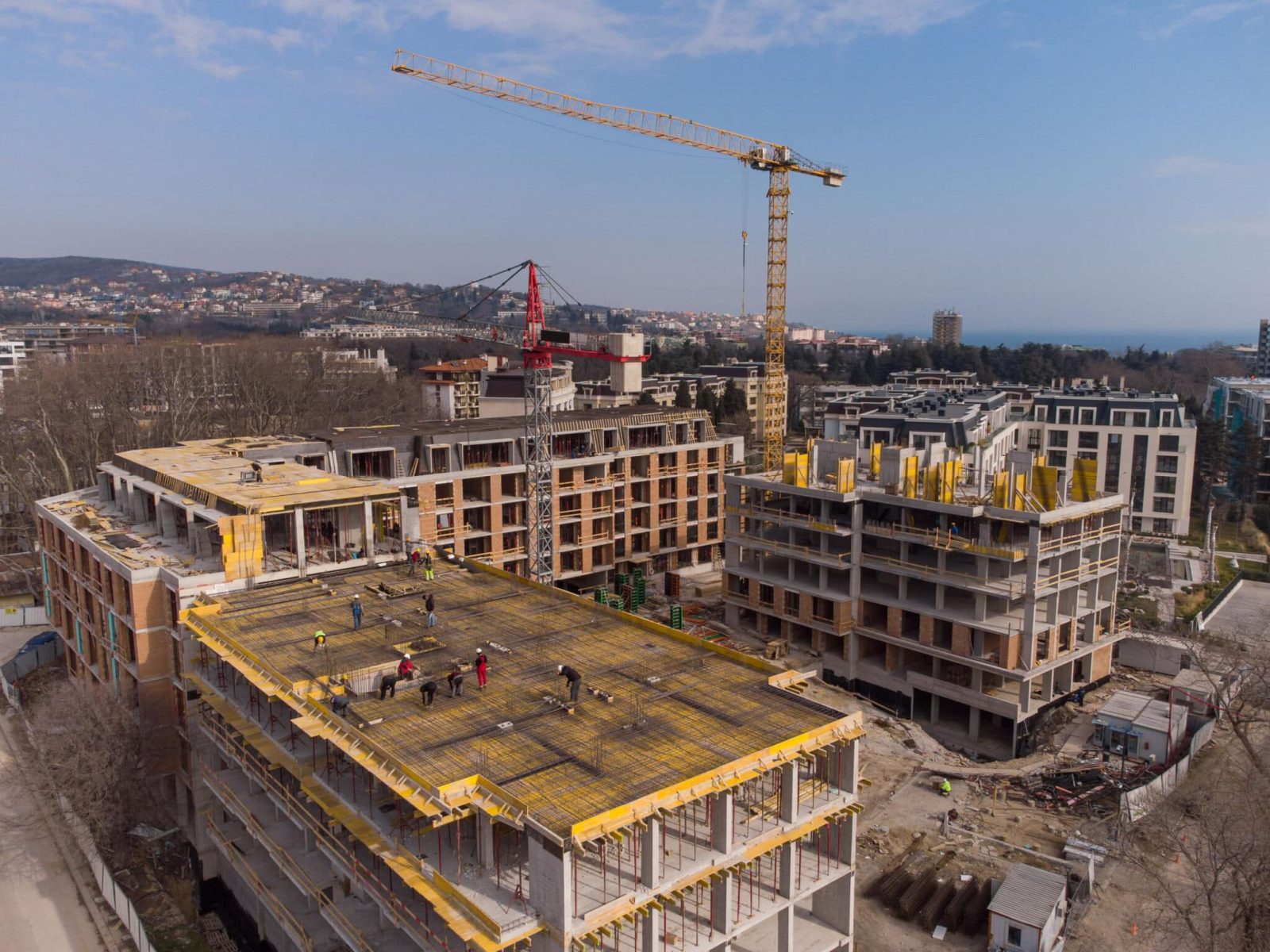 Busy Construction Site and Construction Equipment Aerial view