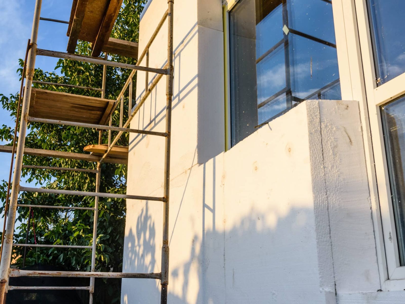 insulation-of-house-with-styrofoam-scaffold-on-bu-2026-01-09-14-58-51-utc